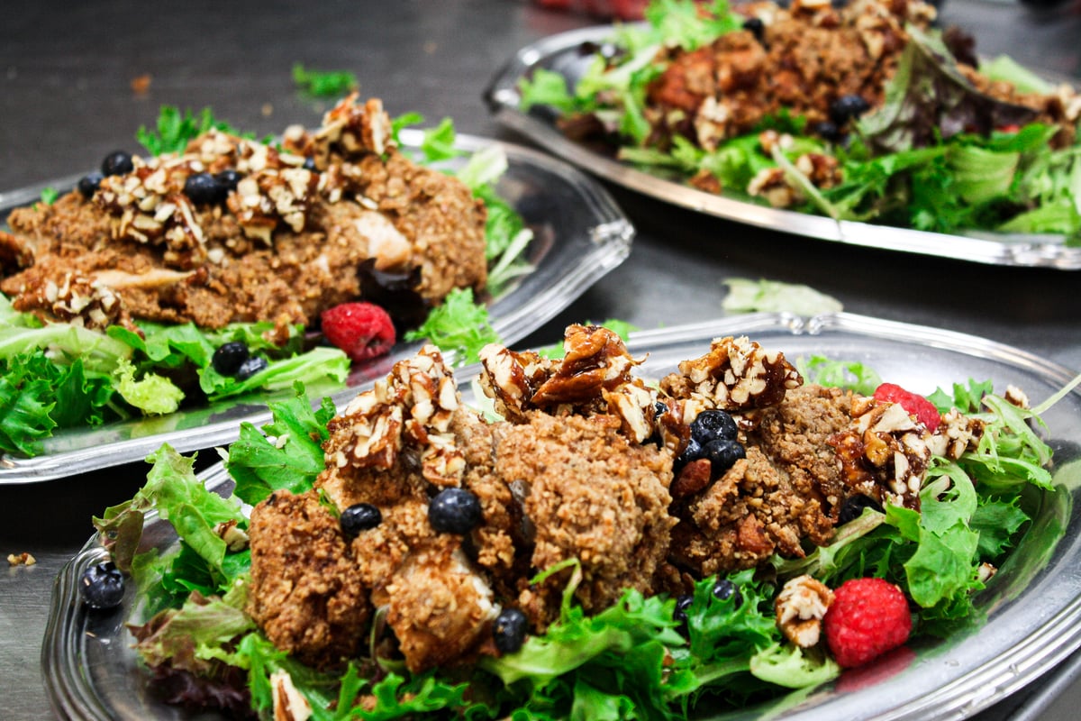 Pecan Meal Fried Chicken & Candied Pecans over Greens