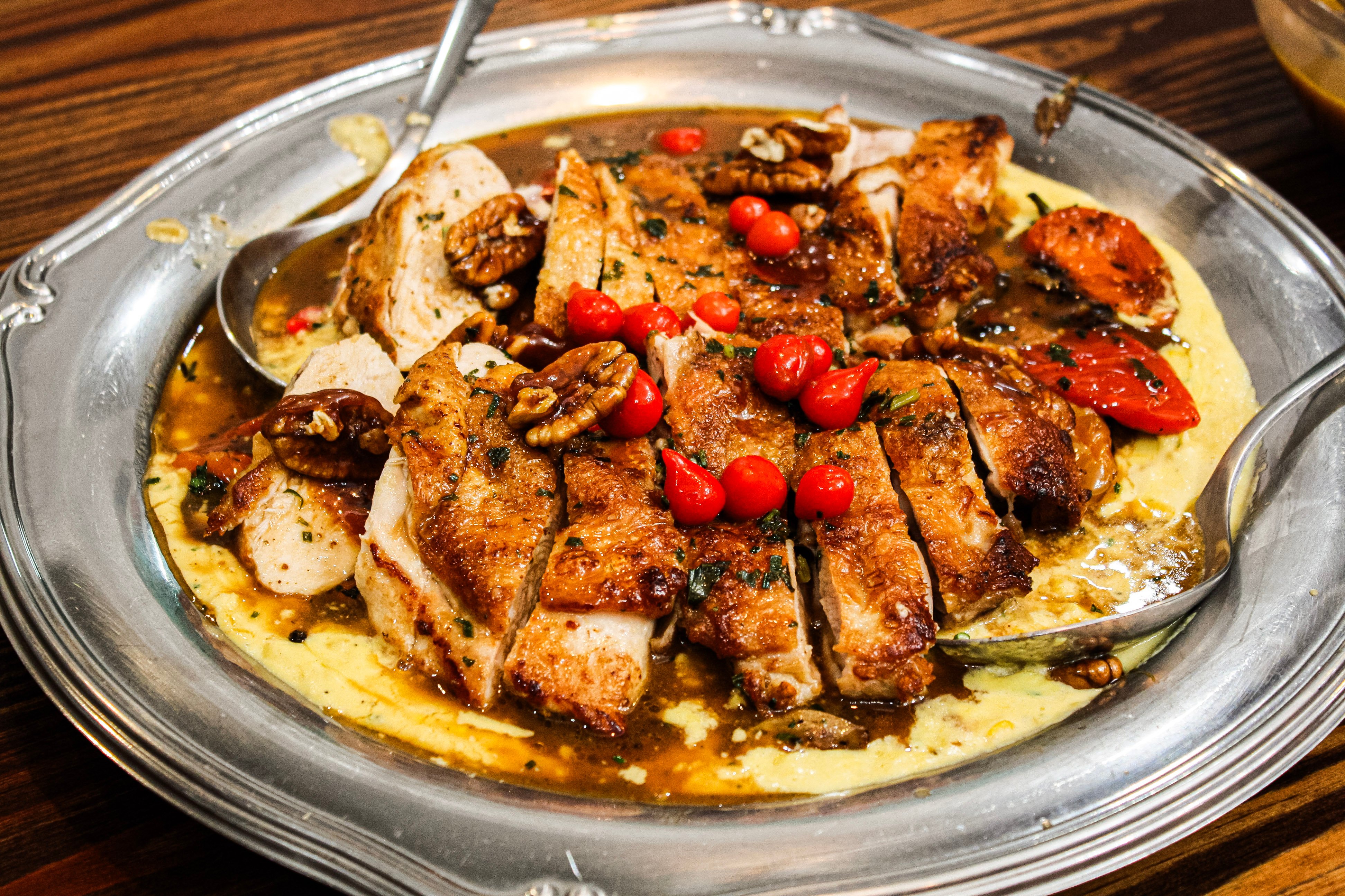 Candied Pecans & Roasted Chicken over Creamed Corn